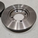 KIA PRIDE MAZDA 121 TARCZE HAMULCOWE PRZÓD KOMPLET TRW DF2662