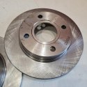 FORD FIESTA IV KA MAZDA 121 TARCZE HAMULCOWE KOMPLET F1531P